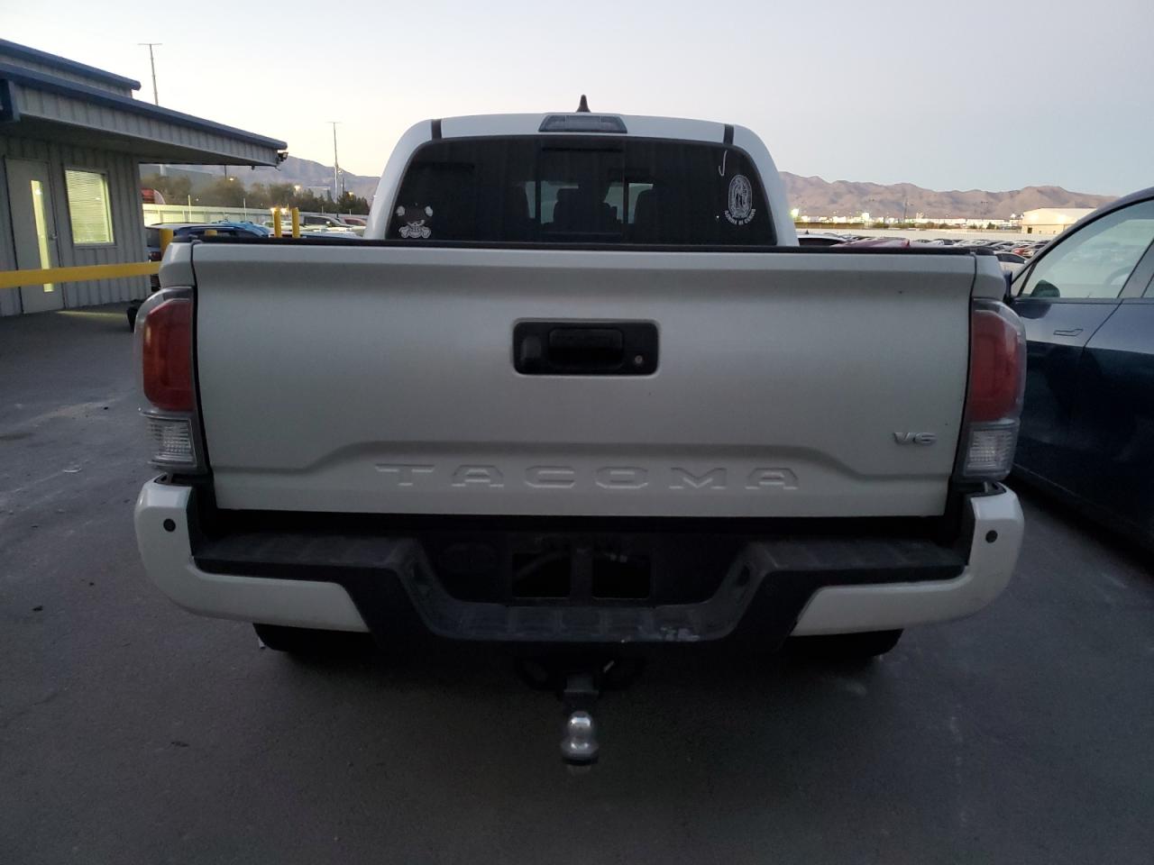 2021 Toyota Tacoma VIN 3TYAZ5CN0MT008377 Copart auction photo, front end / side damage thumbnail 6
