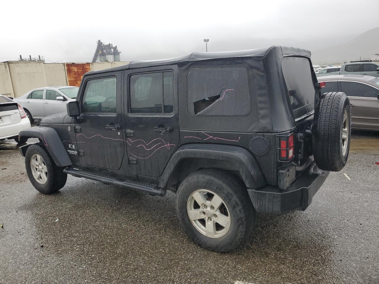 2009 Jeep Wrangler VIN 1J4GA39119L755818 Copart auction photo, vandalism damage thumbnail 2