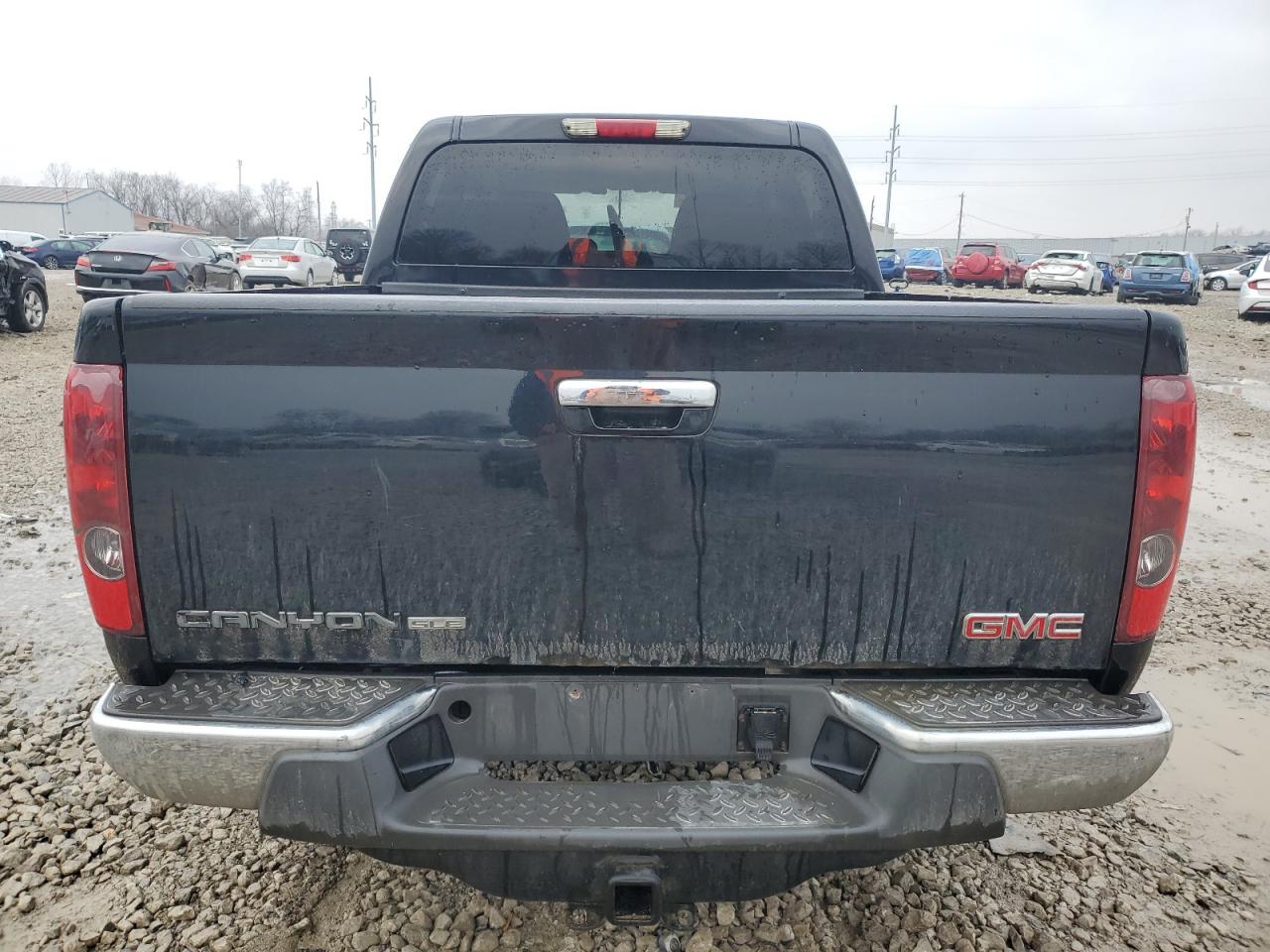 2012 GMC Canyon VIN 1GTH6MFE7C8109153 Copart auction photo, front end / side damage thumbnail 6