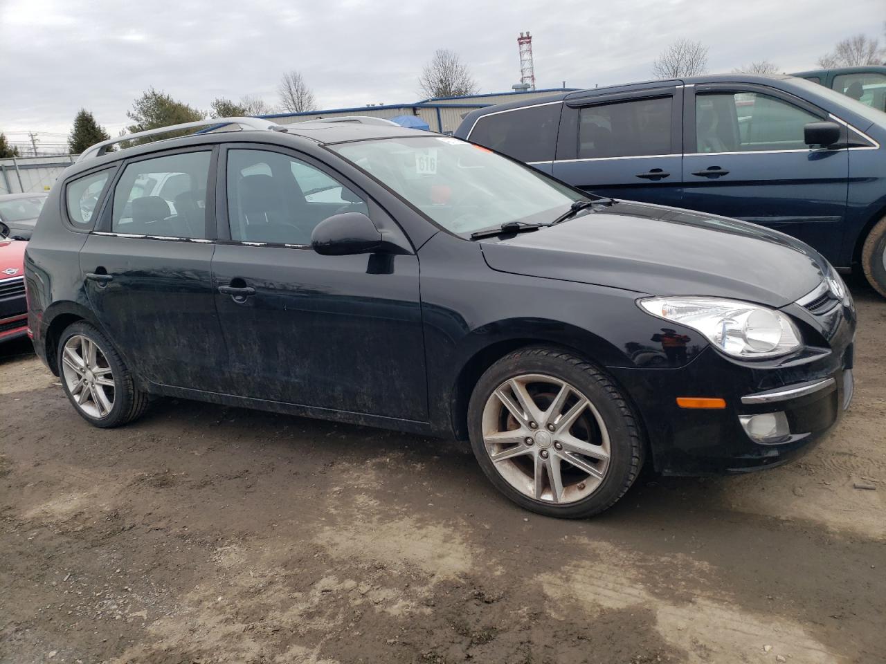2011 Hyundai Elantra VIN KMHDC8AE9BU102812 Copart auction photo, rear end / minor dent/scratches damage thumbnail 4
