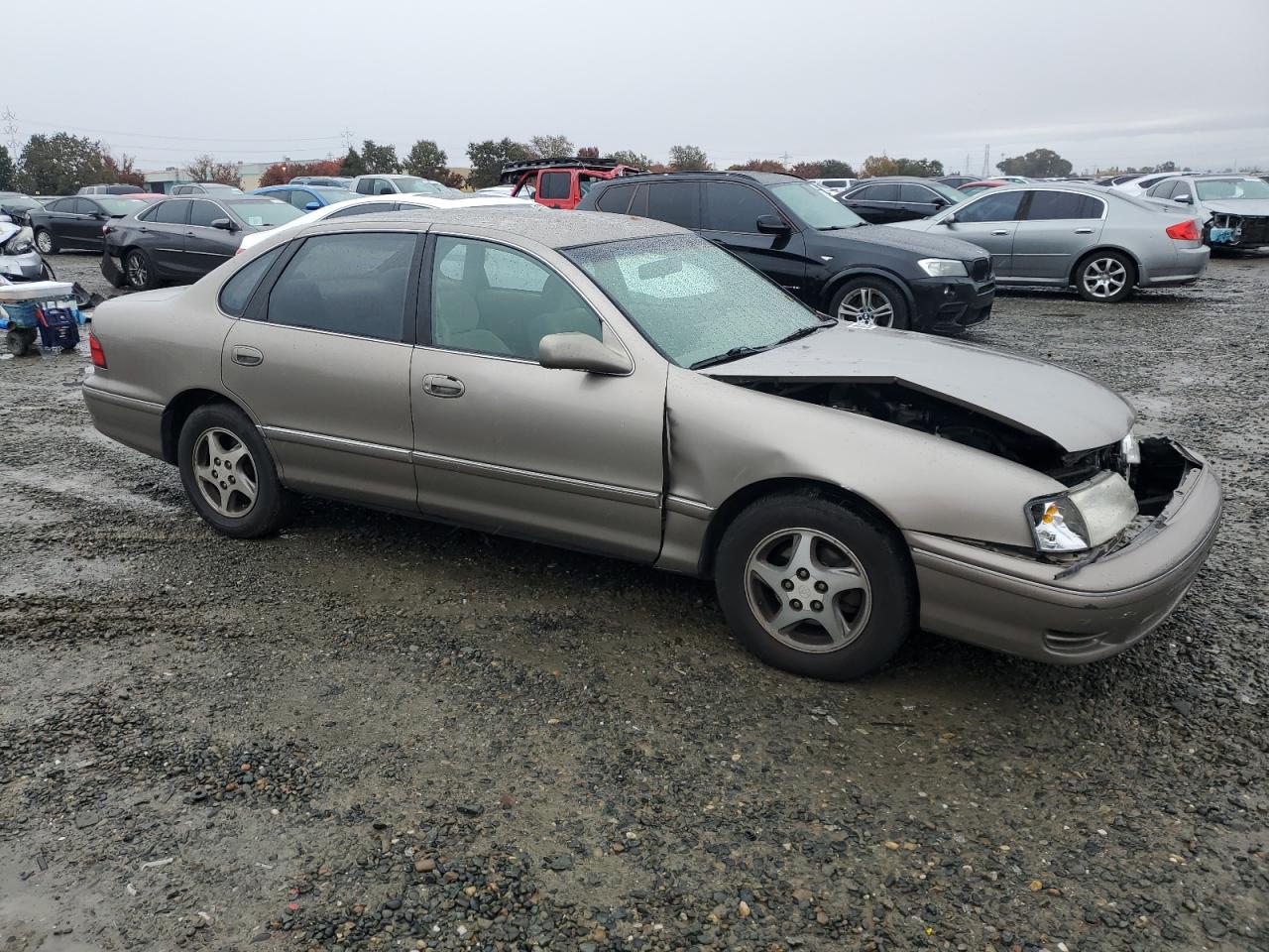 1999 Toyota Avalon VIN 4T1BF18B2XU335357 Copart auction photo, front end / side damage thumbnail 4