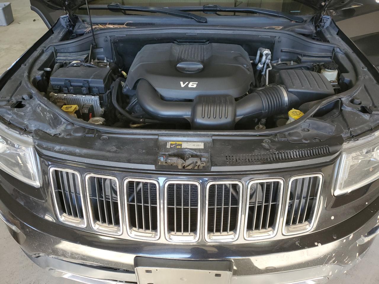 2014 Jeep Grand Cherokee VIN 1C4RJFBG9EC335569 Copart auction photo, rear end / side damage thumbnail 12