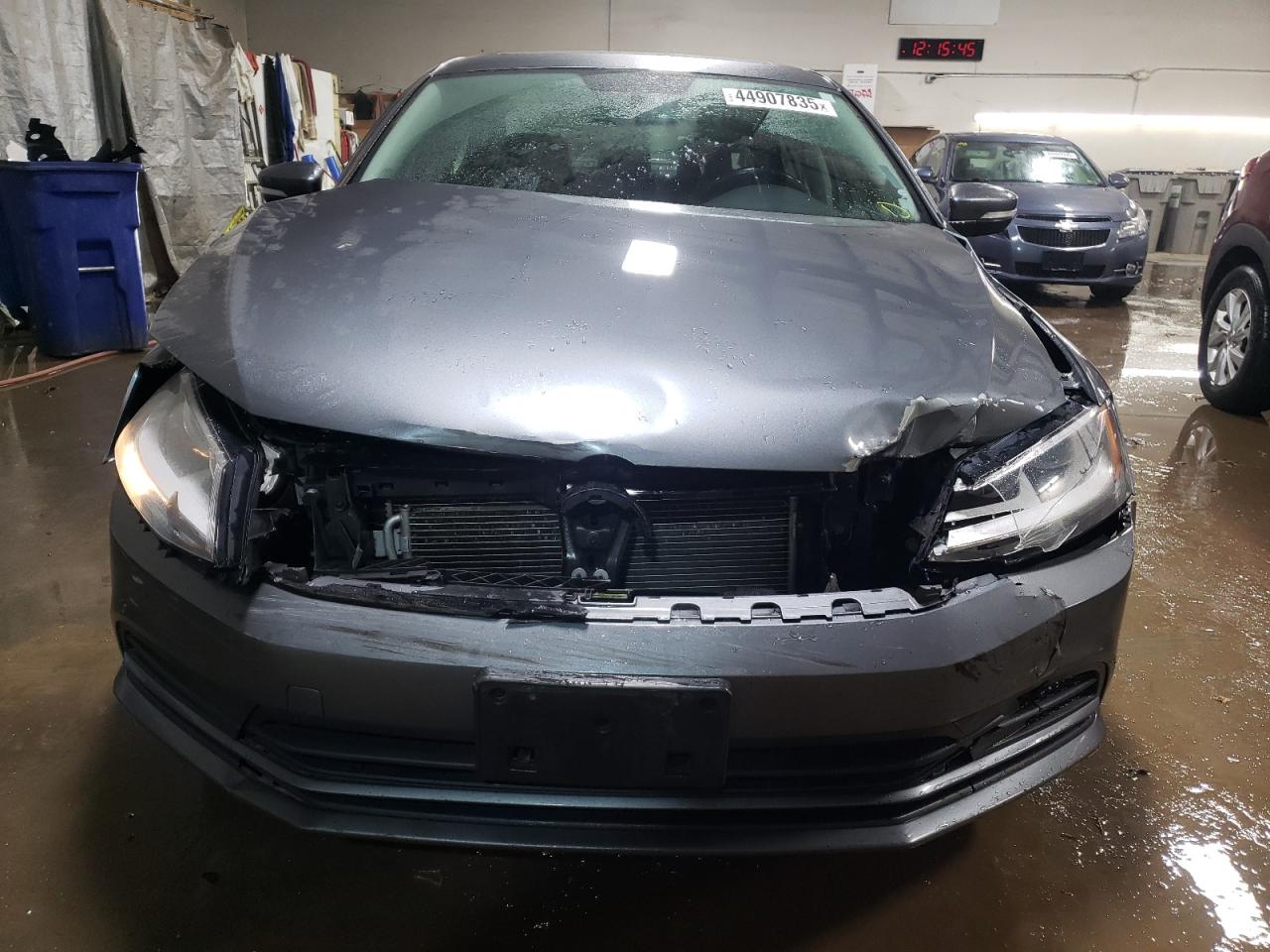2016 Volkswagen Jetta VIN 3VWD67AJ7GM389000 Copart auction photo, front end / side damage thumbnail 5