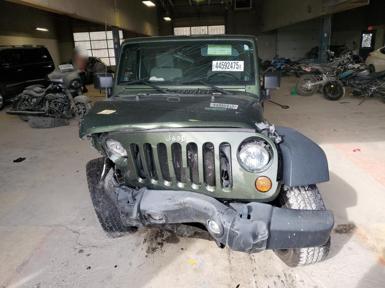 2009 Jeep Wrangler VIN 1J4FA24159L708224 Copart auction photo, front end / minor dent/scratches damage thumbnail 5