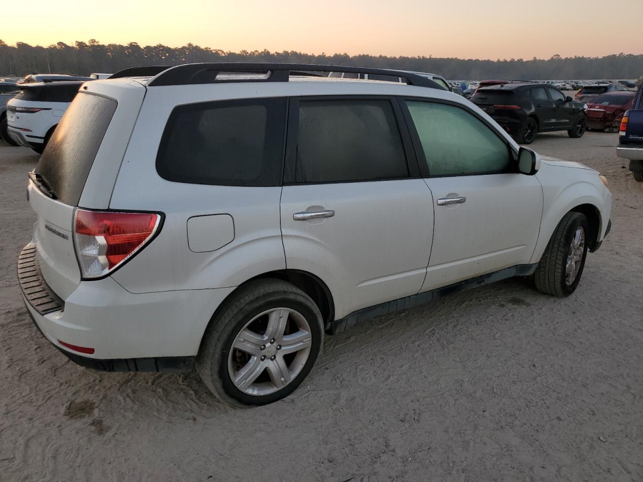 2010 Subaru Forester VIN JF2SH6CC4AH715409 Copart auction photo, minor dent/scratches damage thumbnail 3