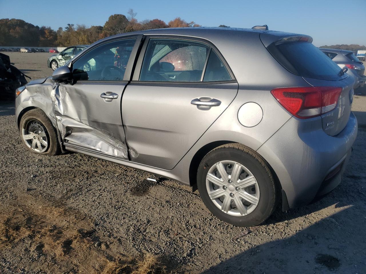 2023 KIA Rio VIN 3KPA25AD9PE579696 Copart auction photo, side / minor dent/scratches damage thumbnail 2