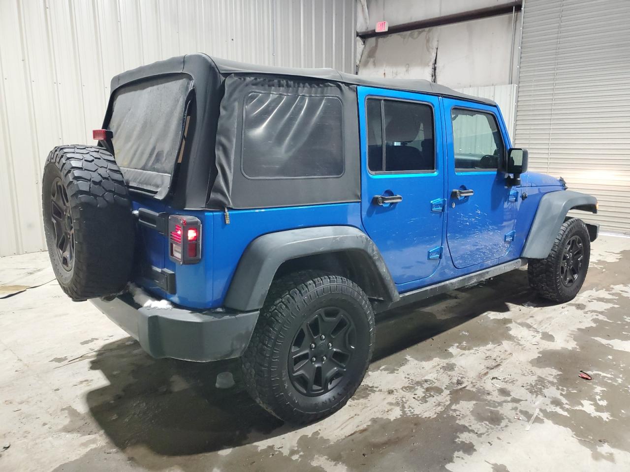2014 Jeep Wrangler VIN 1C4BJWDG6EL317609 Copart auction photo, minor dent/scratches damage thumbnail 3