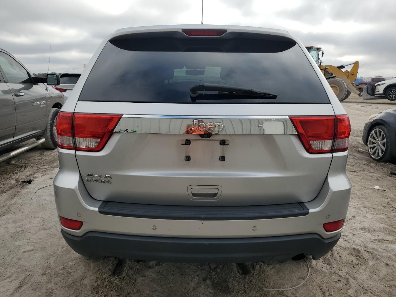 2012 Jeep Grand Cherokee VIN 1C4RJFAG0CC201063 Copart auction photo, front end damage thumbnail 6