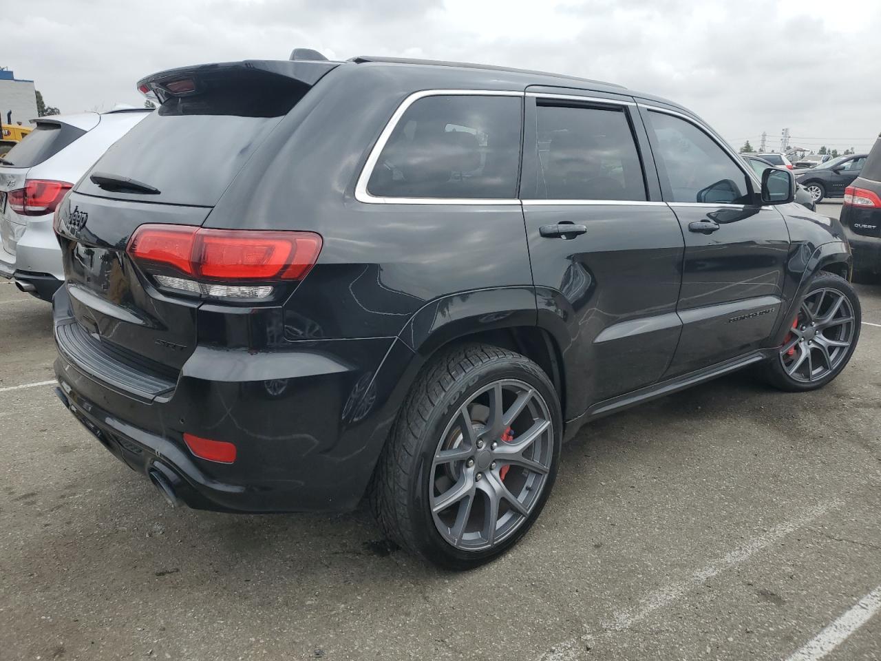 2014 Jeep Grand Cherokee VIN 1C4RJFDJ7EC161025 Copart auction photo, normal wear damage thumbnail 3