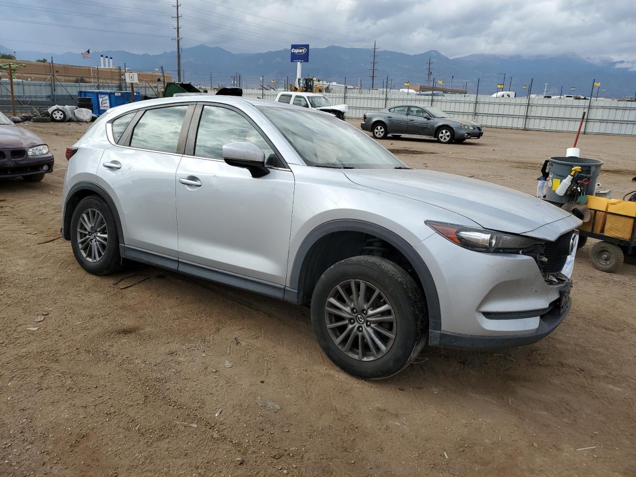 2018 Mazda CX-5 VIN JM3KFBBM6J0423581 Copart auction photo, rear end / side damage thumbnail 4