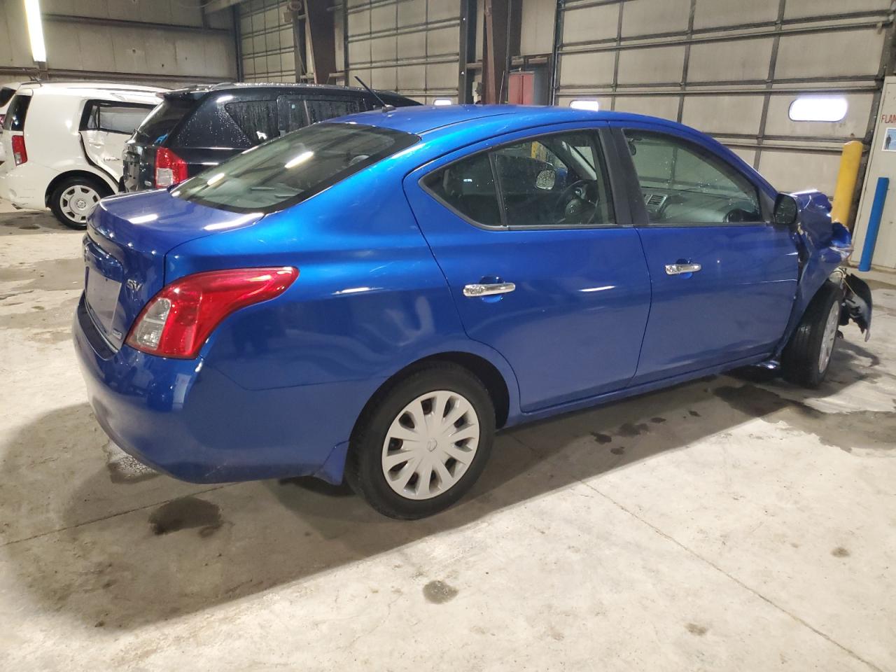 2012 Nissan Versa VIN 3N1CN7APXCL941632 Copart auction photo, front end / minor dent/scratches damage thumbnail 3