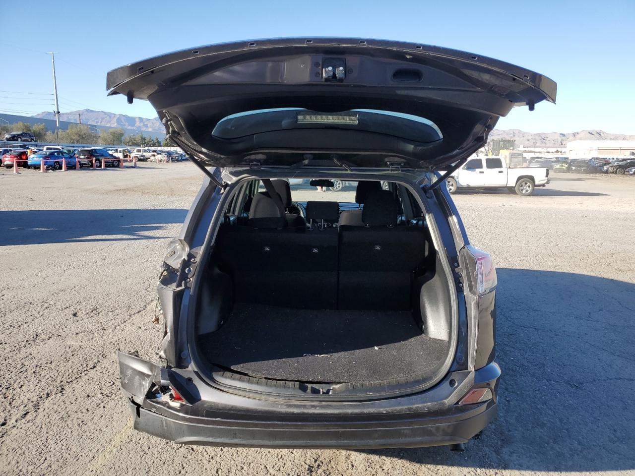 2018 Toyota RAV 4 VIN JTMZFREV7JJ161844 Copart auction photo, rear end / side damage thumbnail 6