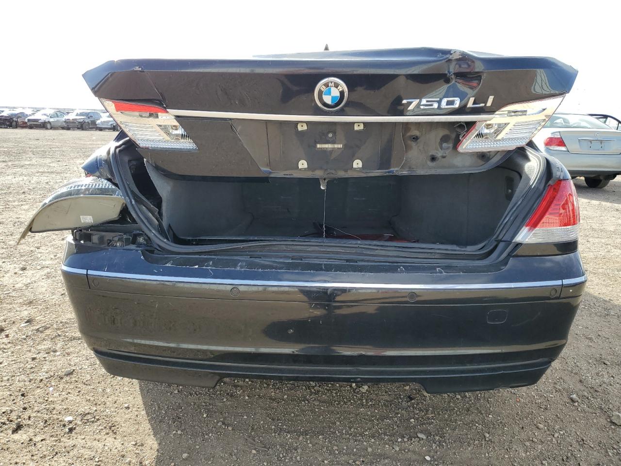 2006 BMW 7er VIN WBAHN83566DT63296 Copart auction photo, rear end damage thumbnail 6