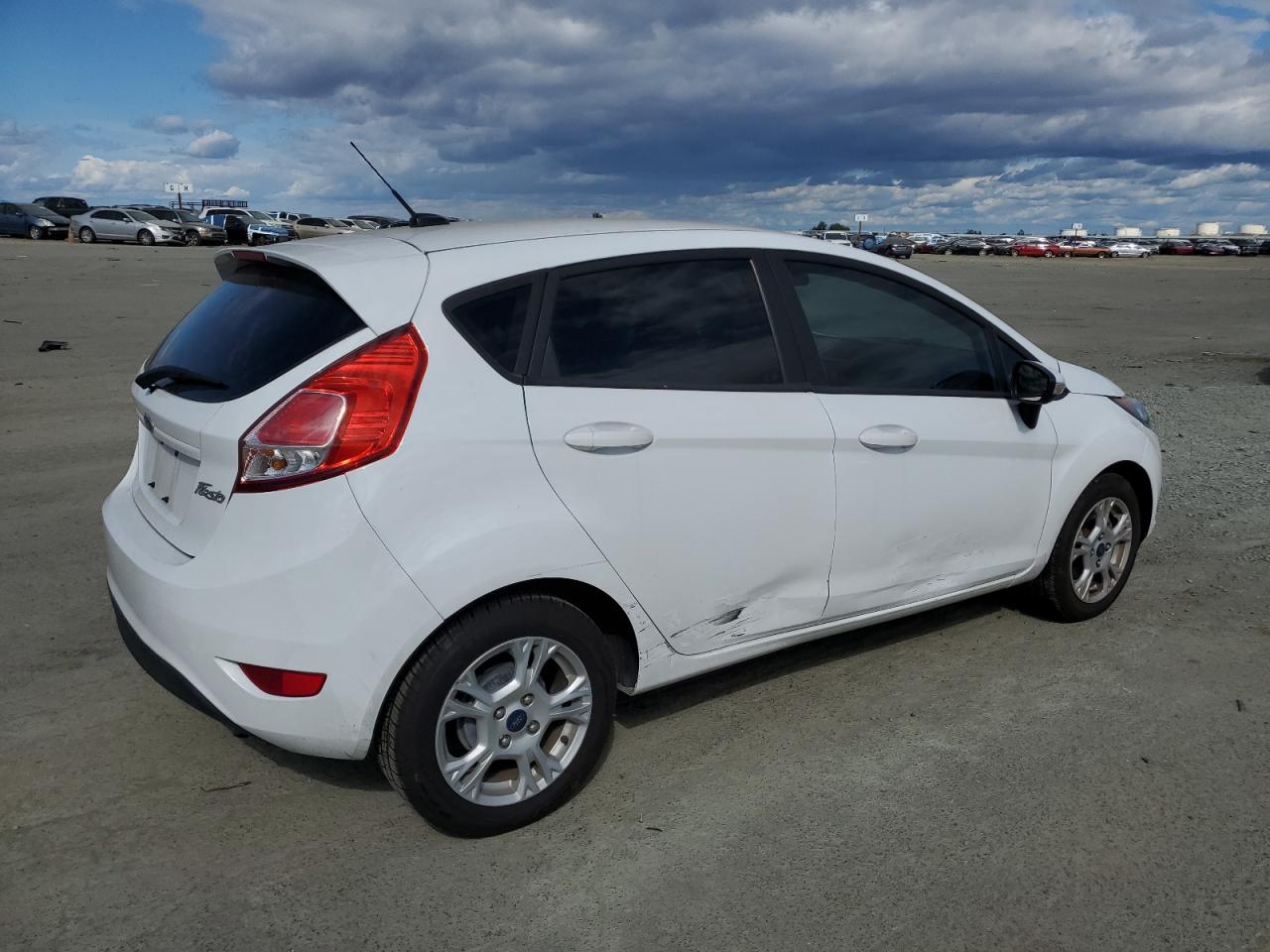 2016 Ford Fiesta VIN 3FADP4EJ6GM154831 Copart auction photo, front end / side damage thumbnail 3