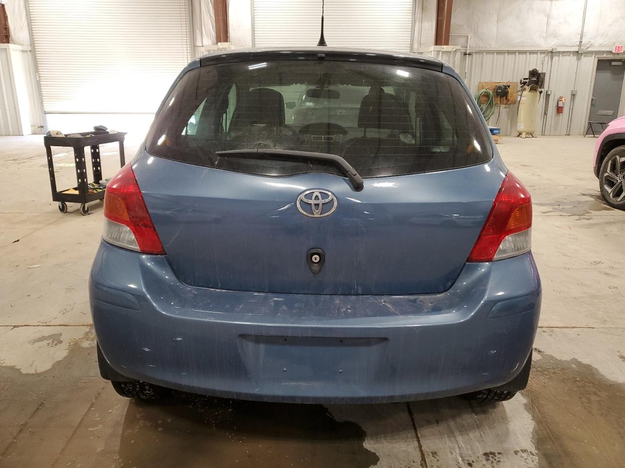 2009 Toyota Yaris VIN JTDKT903095240941 Copart auction photo, front end damage thumbnail 6