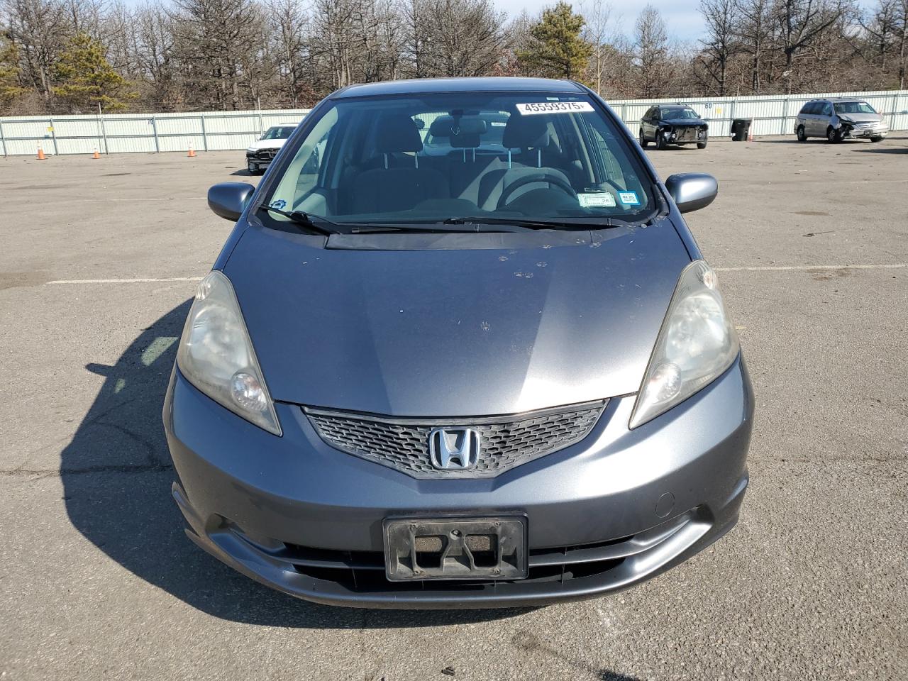 2013 Honda Fit VIN JHMGE8H34DC080256 Copart auction photo, rear end / minor dent/scratches damage thumbnail 5