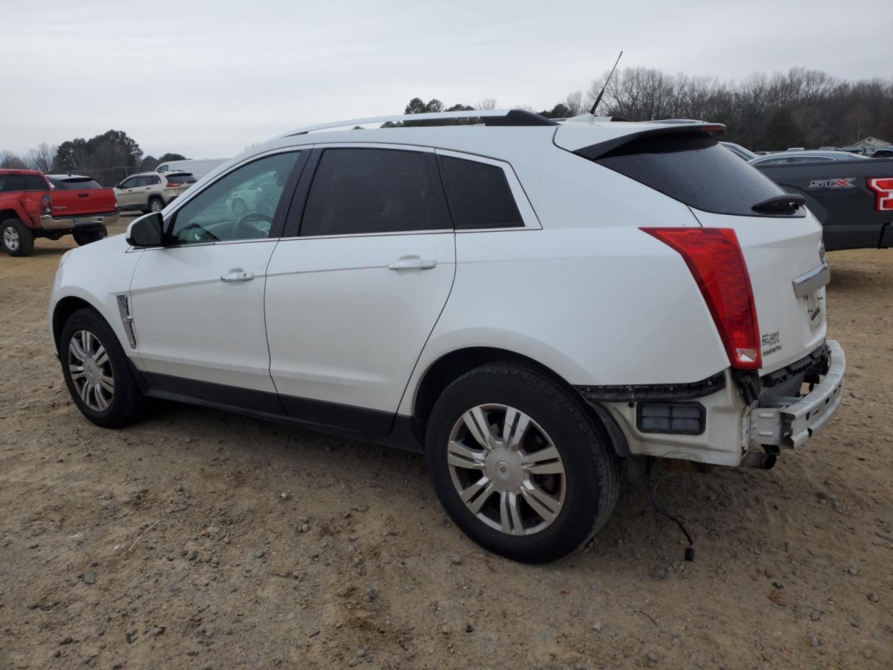 2012 Cadillac SRX VIN 3GYFNAE33CS654194 Copart auction photo, side / rear end damage thumbnail 2