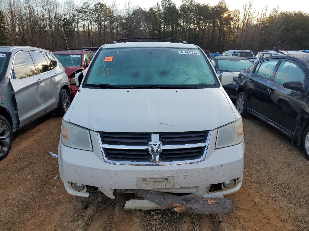 2010 Dodge Caravan VIN 2D4RN5D14AR434523 Copart auction photo, front end / undercarriage damage thumbnail 5