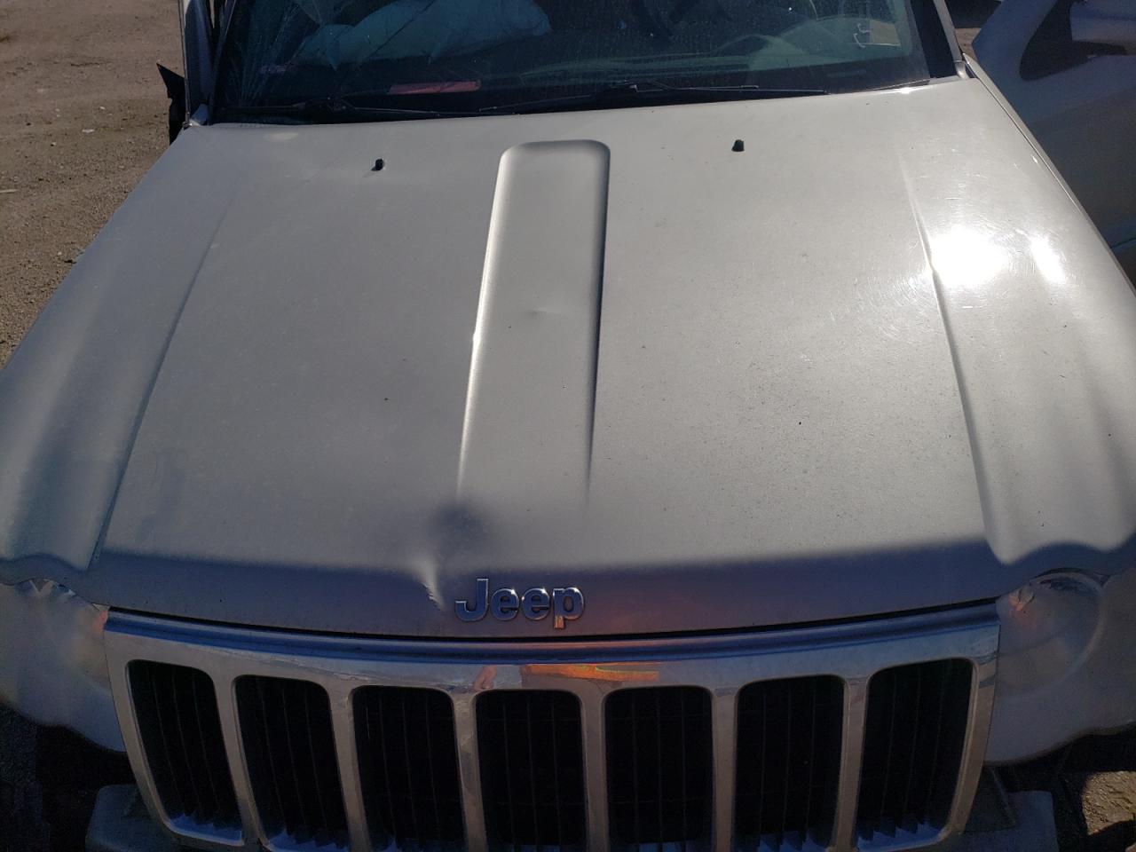 2010 Jeep Grand Cherokee VIN 1J4RR5GT3AC138636 Copart auction photo, all over damage thumbnail 13