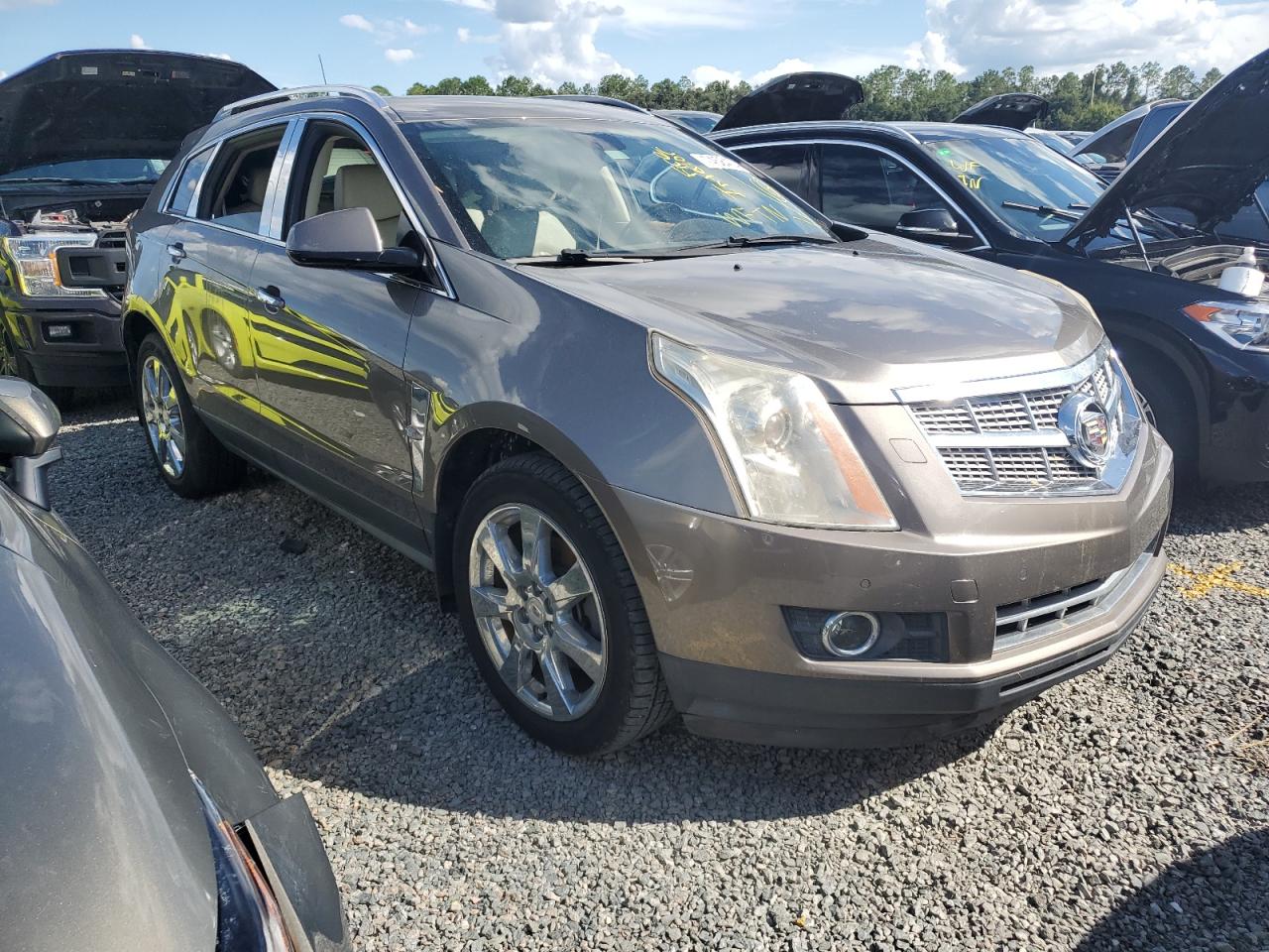 2011 Cadillac SRX VIN 3GYFNBEY2BS655918 Copart auction photo, water/flood damage thumbnail 4