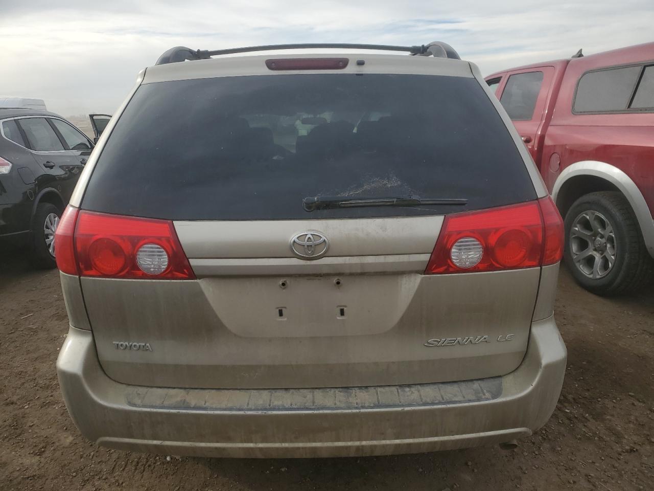 2009 Toyota Sienna VIN 5TDZK23CX9S252934 Copart auction photo, front end / rear end damage thumbnail 6