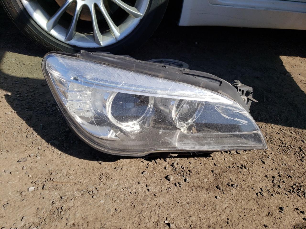 2014 BMW 7er VIN WBAYF4C50ED281830 Copart auction photo, front end / minor dent/scratches damage thumbnail 12