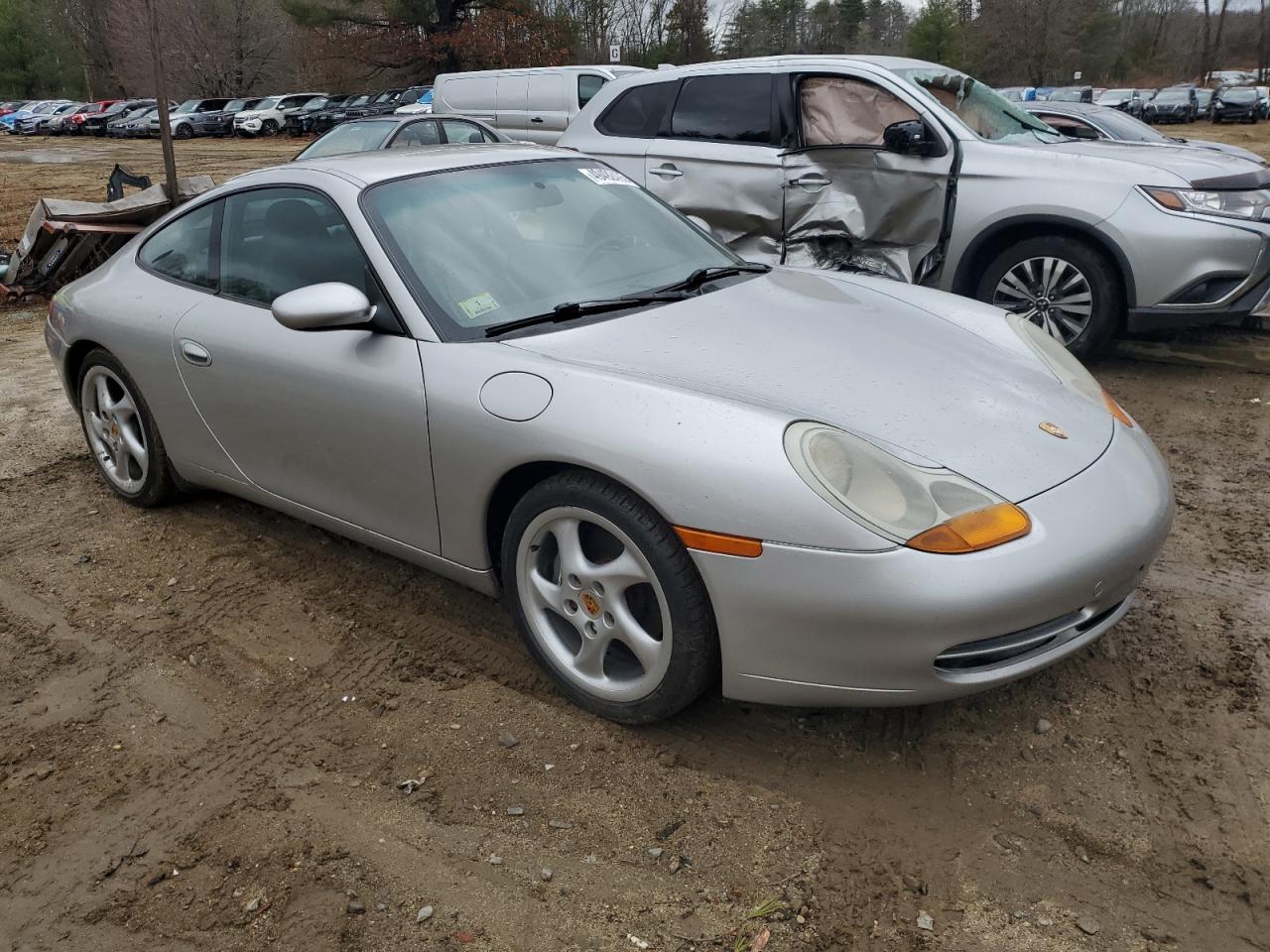 1999 Porsche 911 VIN WP0AA2992XS621138 Copart auction photo, normal wear / minor dent/scratches damage thumbnail 4