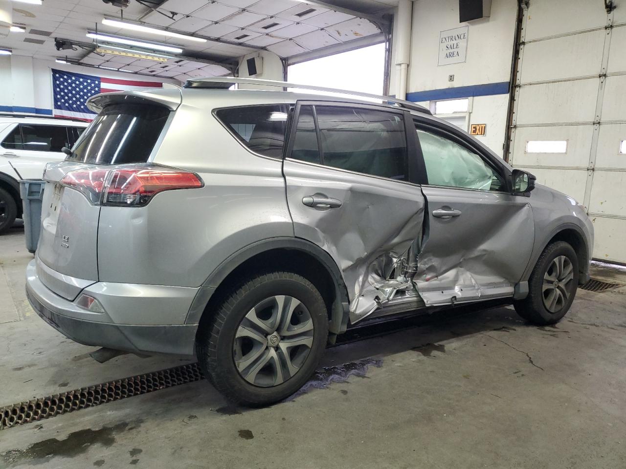2018 Toyota RAV 4 VIN 2T3BFREV6JW725213 Copart auction photo, side damage thumbnail 3