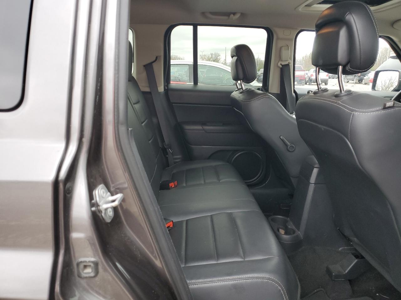 2015 Jeep Liberty (Patriot) VIN 1C4NJRFB8FD168597 Copart auction photo, side damage thumbnail 11