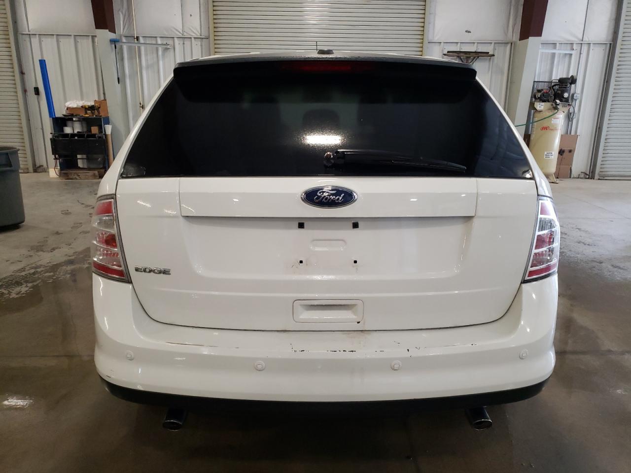 2009 Ford Edge VIN 2FMDK36CX9BA62074 Copart auction photo, side / front end damage thumbnail 6