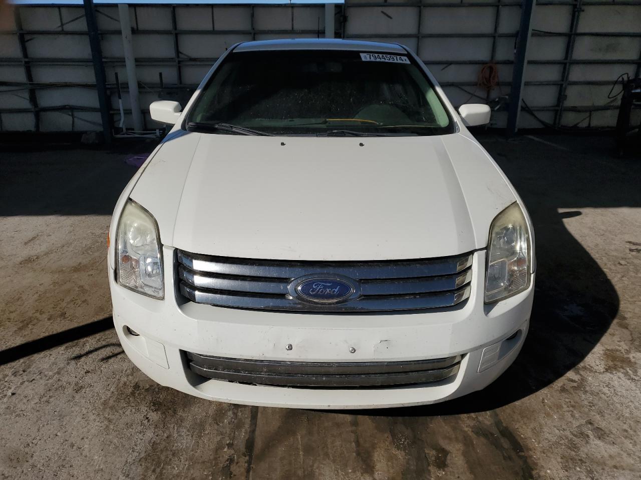 2009 Ford Fusion VIN 3FAHP07119R103072 Copart auction photo, vandalism damage thumbnail 5