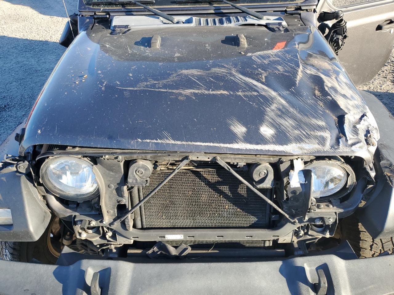 2020 Jeep Wrangler VIN 1C4HJXDN4LW114910 Copart auction photo, all over damage thumbnail 13