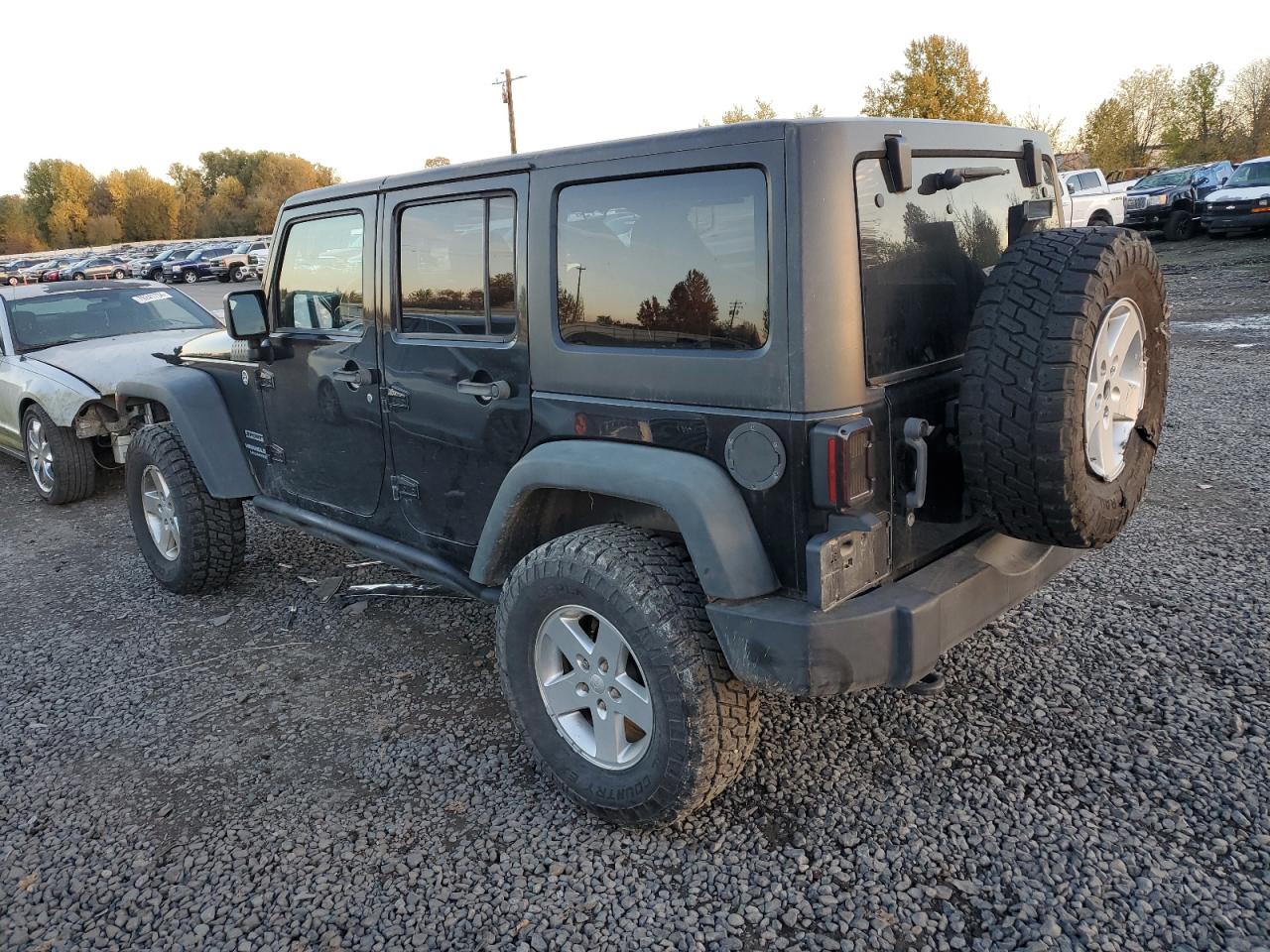 2012 Jeep Wrangler VIN 1C4HJWDG6CL200037 Copart auction photo, side damage thumbnail 2