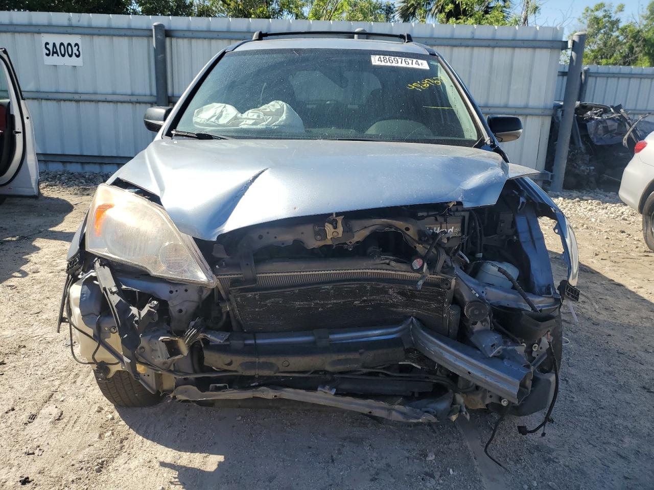 2009 Honda CR-V VIN 3CZRE38549G703386 Copart auction photo, front end damage thumbnail 5