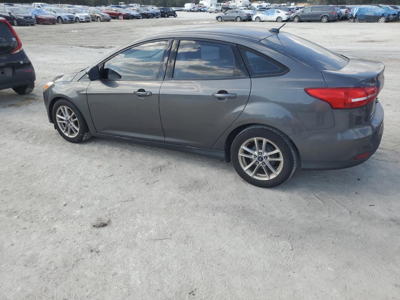 2016 Ford Focus VIN 1FADP3F23GL276646 Copart auction photo, normal wear / minor dent/scratches damage thumbnail 2