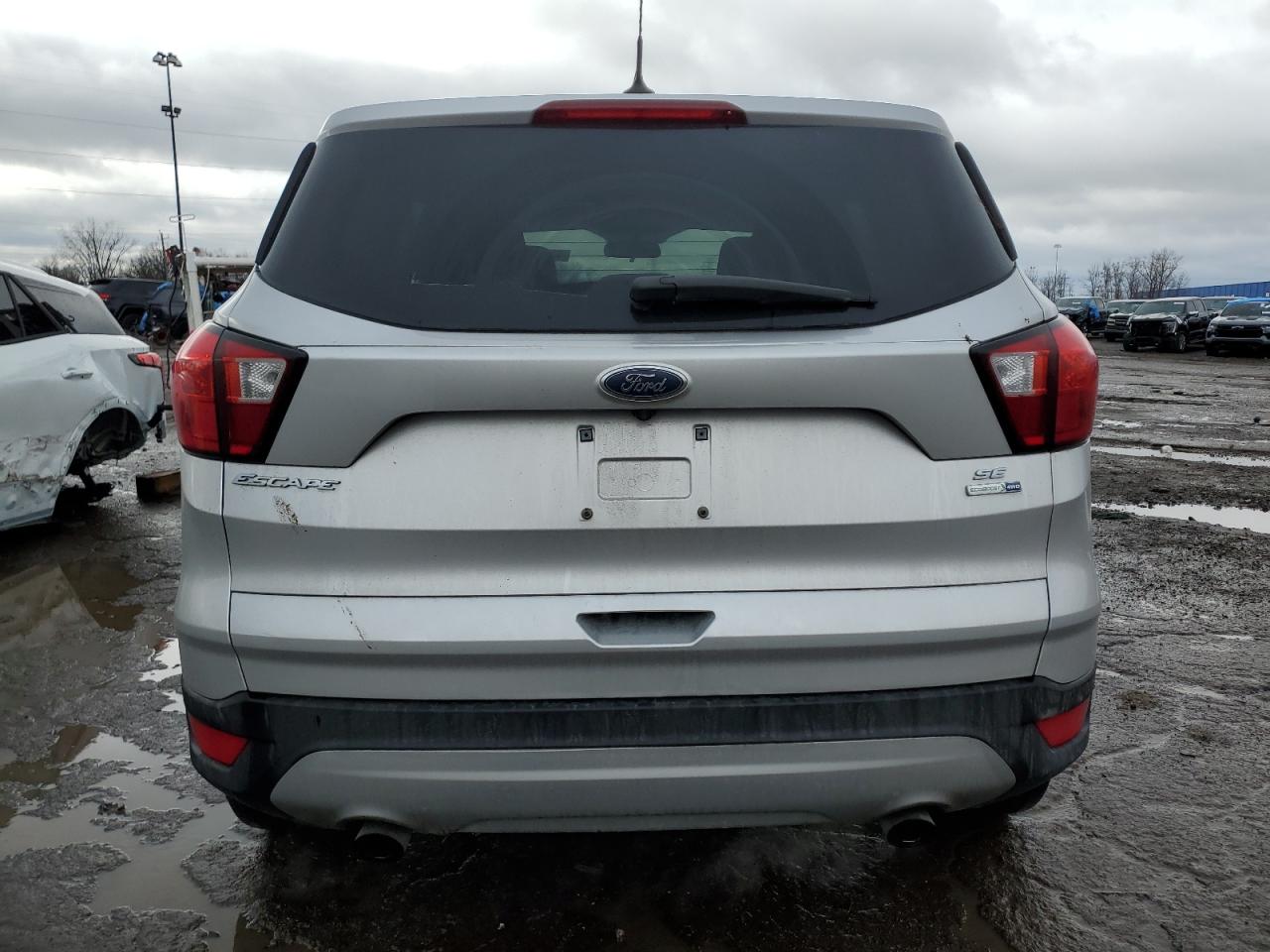 2019 Ford Escape VIN 1FMCU9GD8KUA69704 Copart auction photo, front end / side damage thumbnail 6