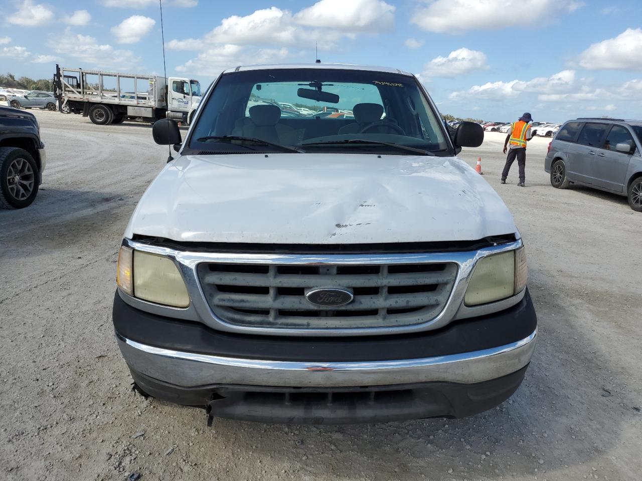 2003 Ford F-150 VIN 1FTRX18W13NB50773 Copart auction photo, side damage thumbnail 5