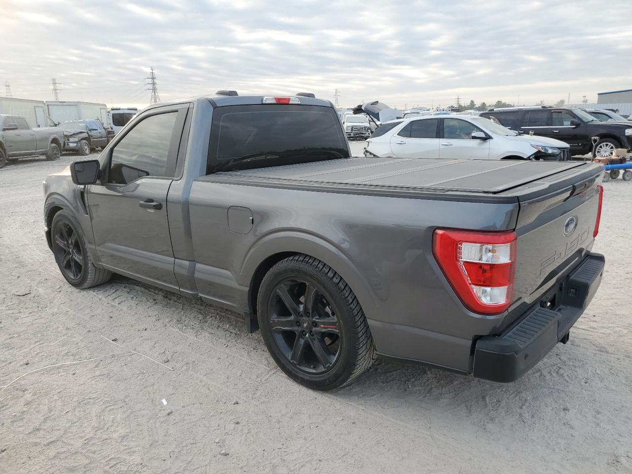 2023 Ford F-150 VIN 1FTMF1C5XPKF21948 Copart auction photo, vandalism damage thumbnail 2