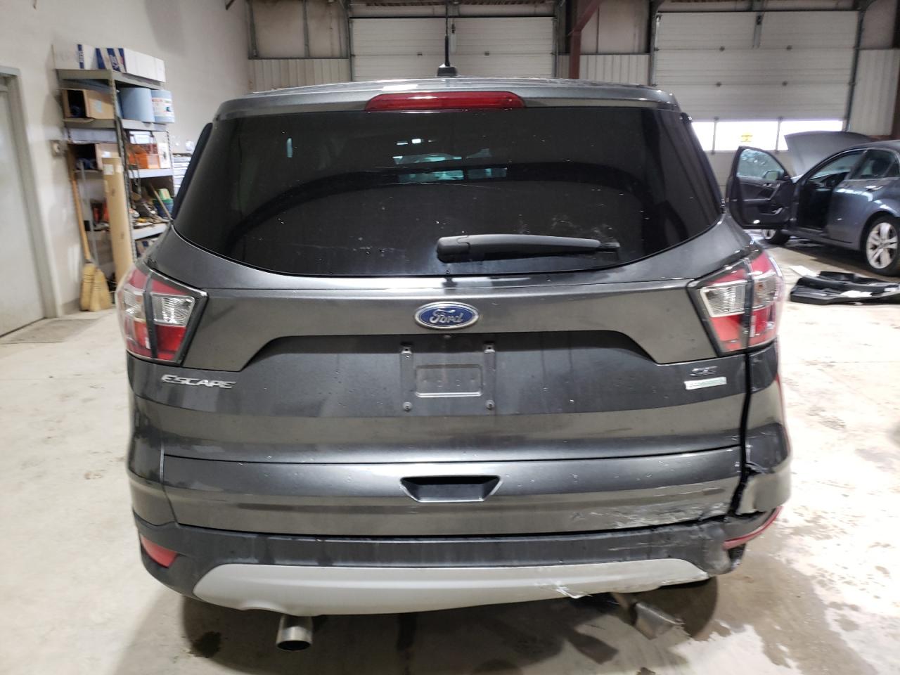 2017 Ford Escape VIN 1FMCU0GDXHUA20640 Copart auction photo, all over damage thumbnail 6