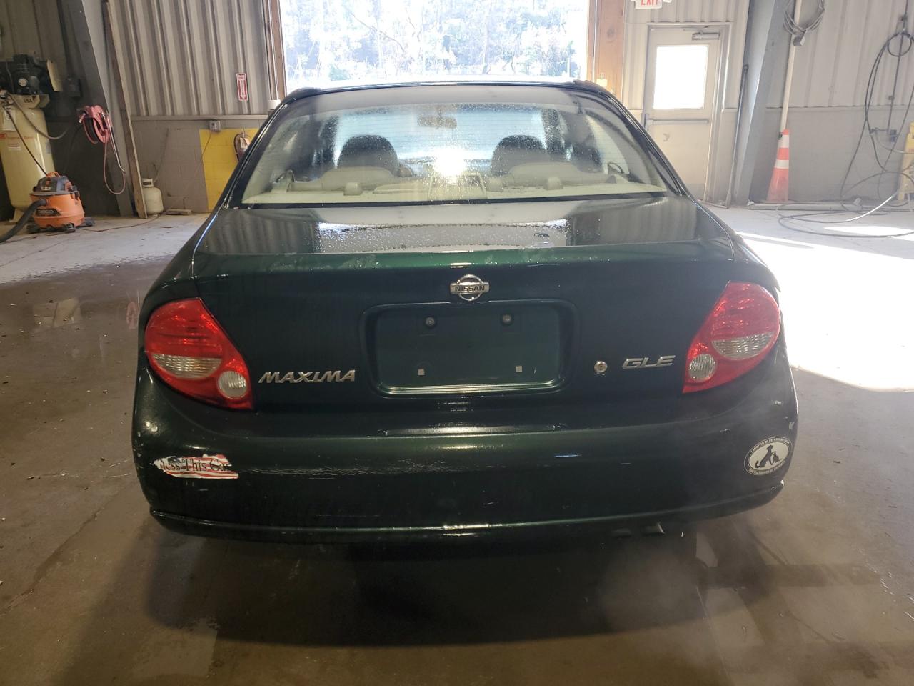2000 Nissan Maxima VIN JN1CA31D1YT745348 Copart auction photo, minor dent/scratches damage thumbnail 6