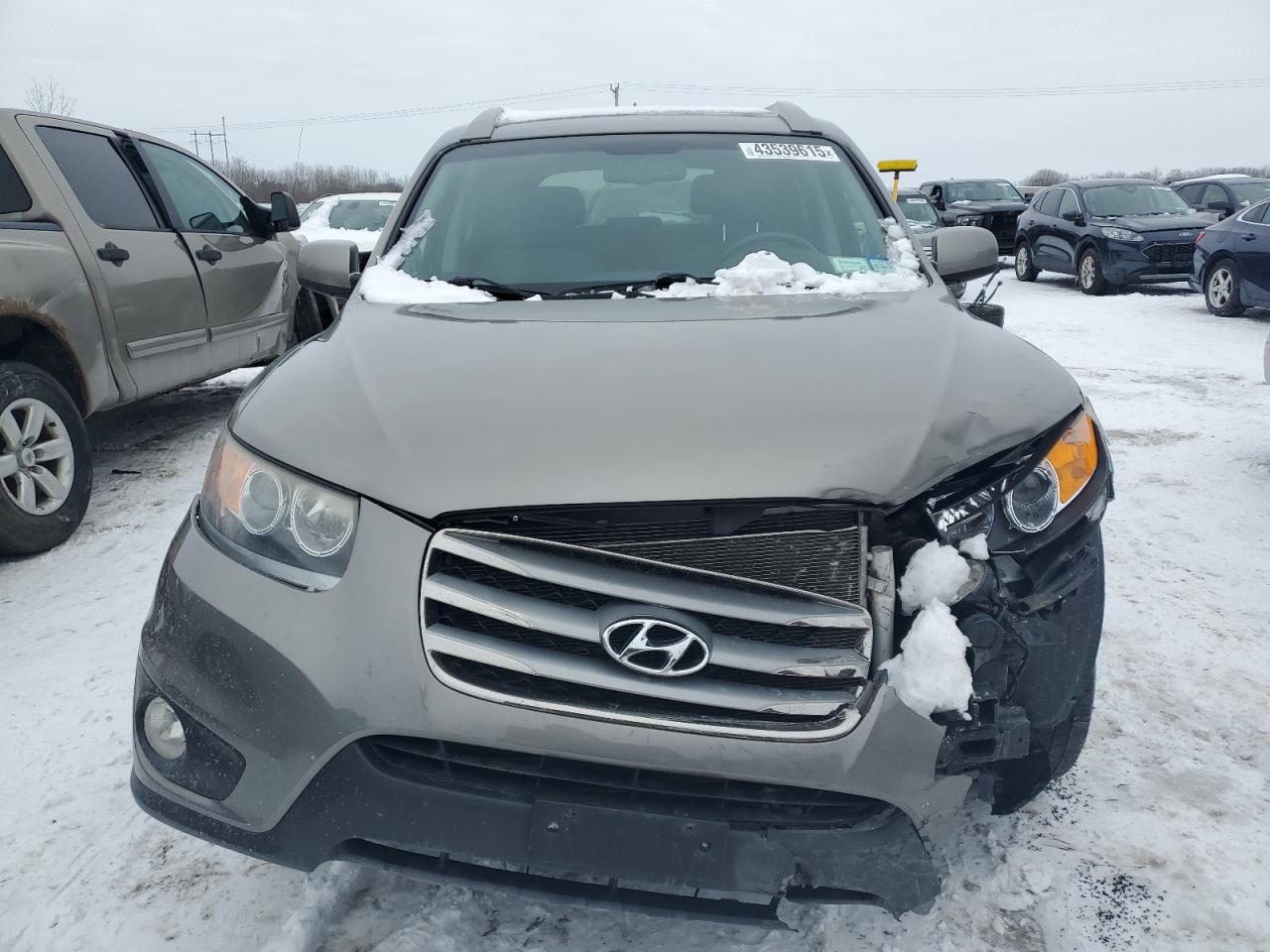 2012 Hyundai Santa Fe VIN 5XYZHDAG5CG144077 Copart auction photo, front end damage thumbnail 5