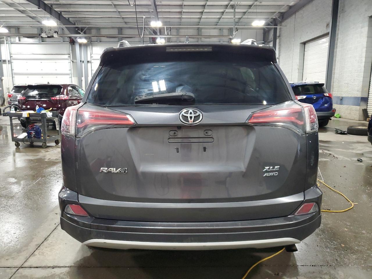 2016 Toyota RAV 4 VIN 2T3RFREV8GW463668 Copart auction photo, all over damage thumbnail 6