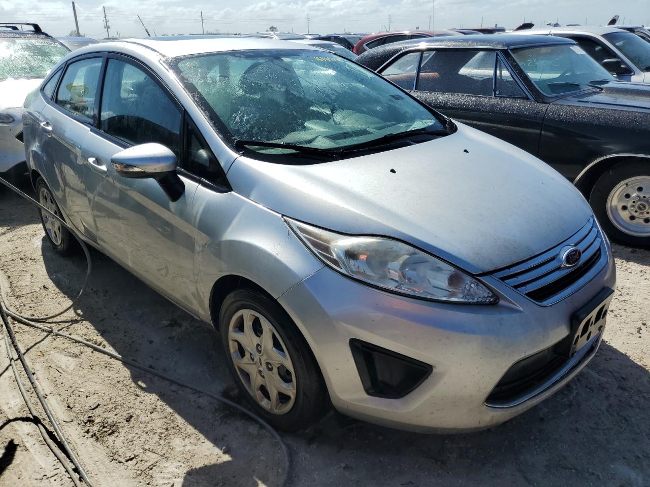 2013 Ford Fiesta VIN 3FADP4BJ7DM222876 Copart auction photo, water/flood damage thumbnail 4