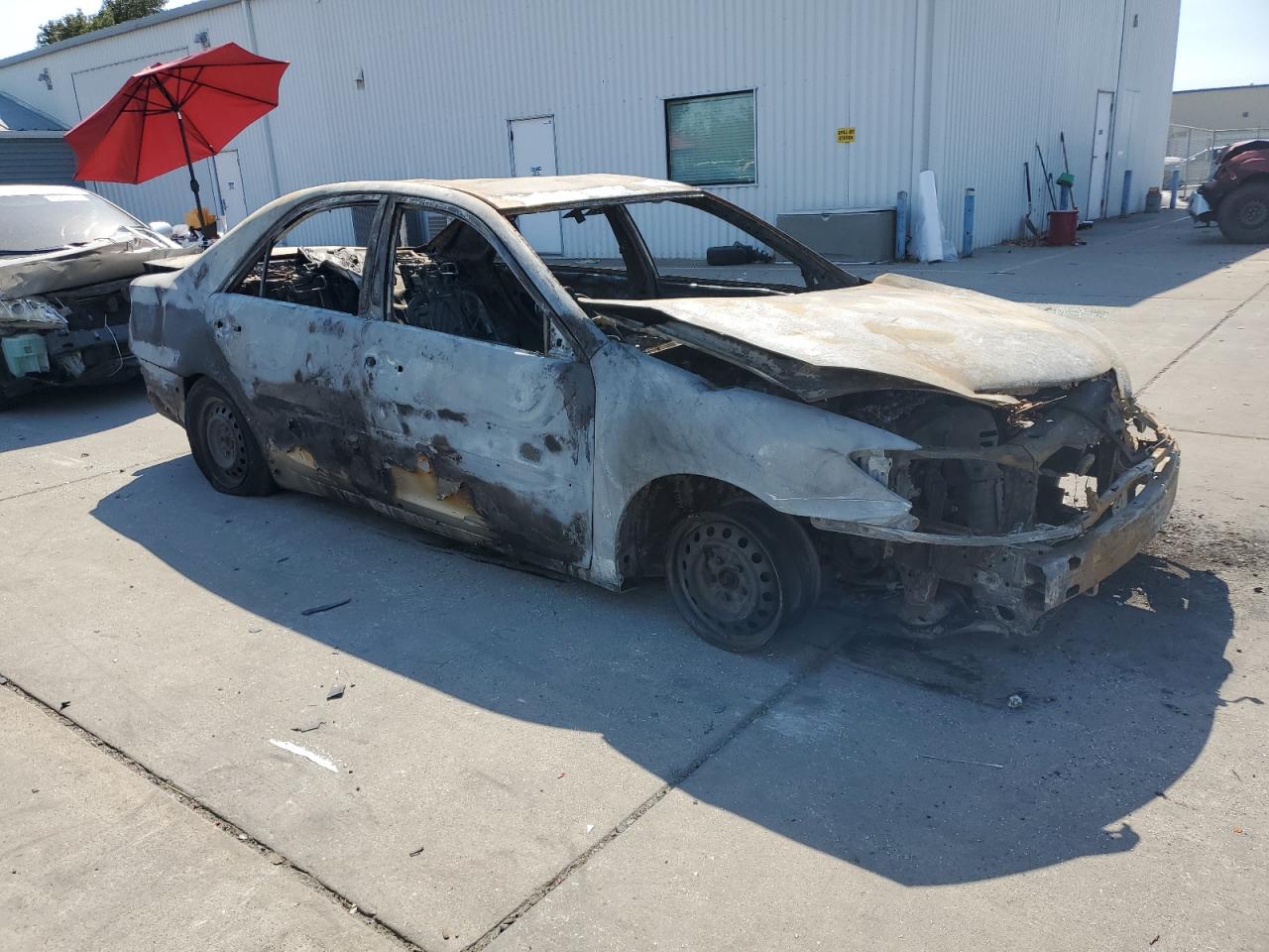 2003 Toyota Camry VIN 4T1BE32KX3U130256 Copart auction photo, burn damage thumbnail 4