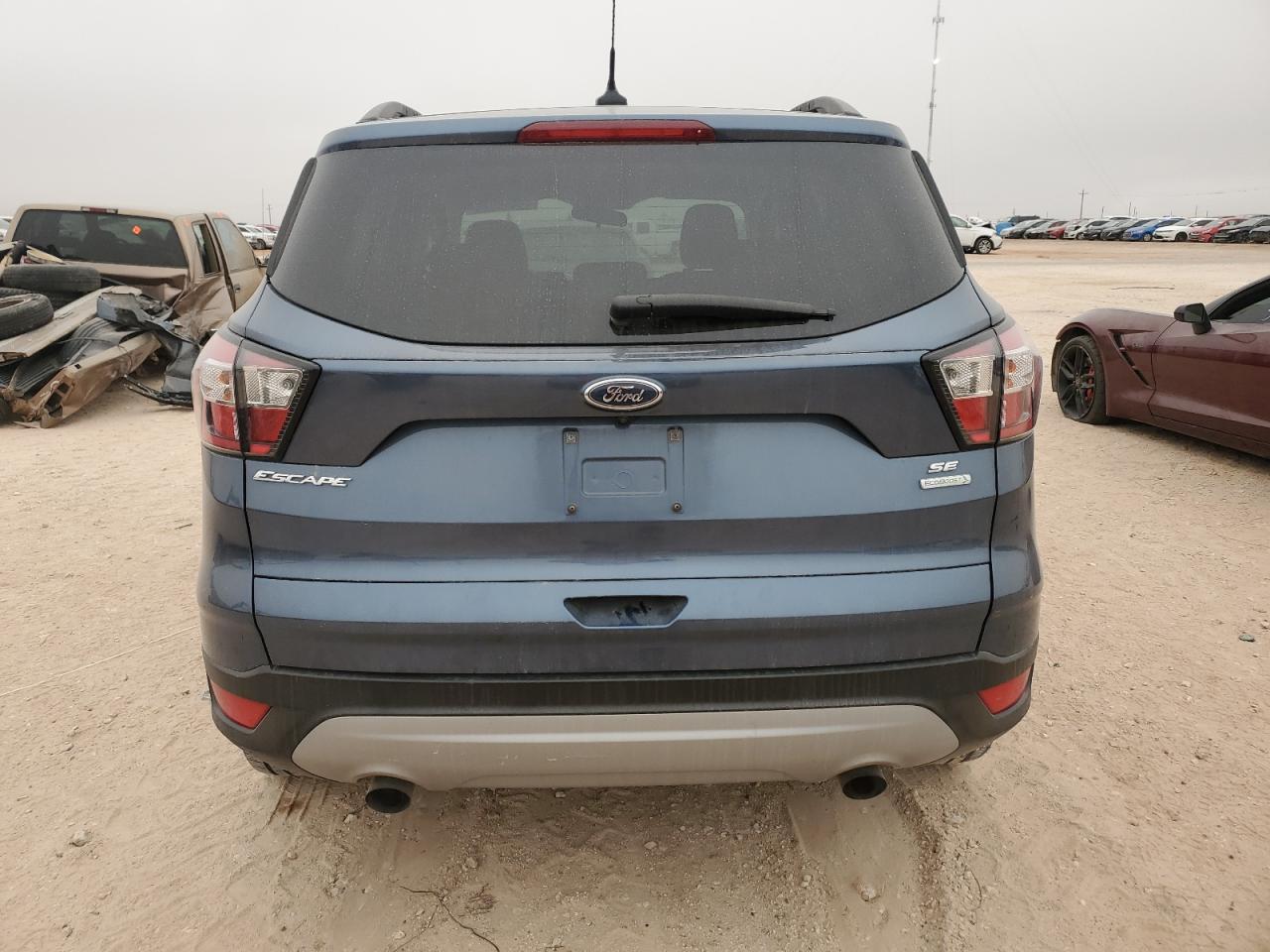 2018 Ford Escape VIN 1FMCU0GD7JUB84515 Copart auction photo, front end / all over damage thumbnail 6