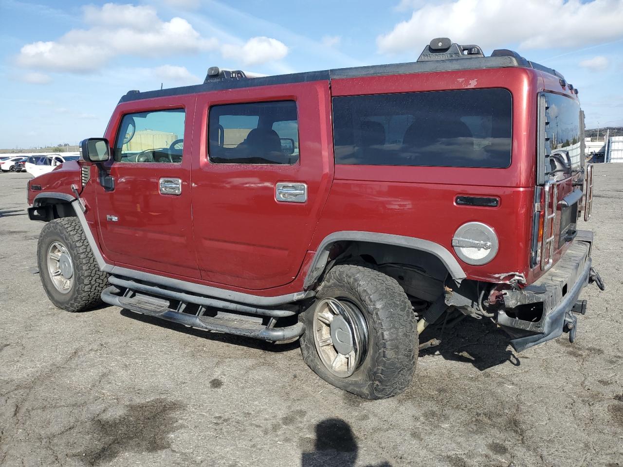2003 Hummer H2 VIN 5GRGN23U73H128461 Copart auction photo, rear end damage thumbnail 2