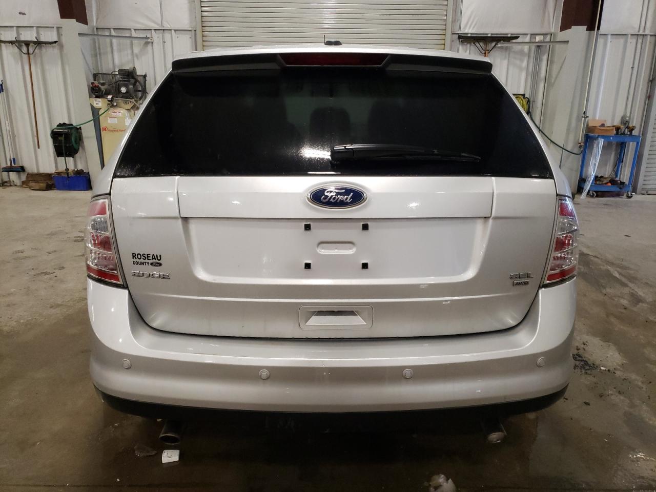 2010 Ford Edge VIN 2FMDK4JCXABB59454 Copart auction photo, front end damage thumbnail 6