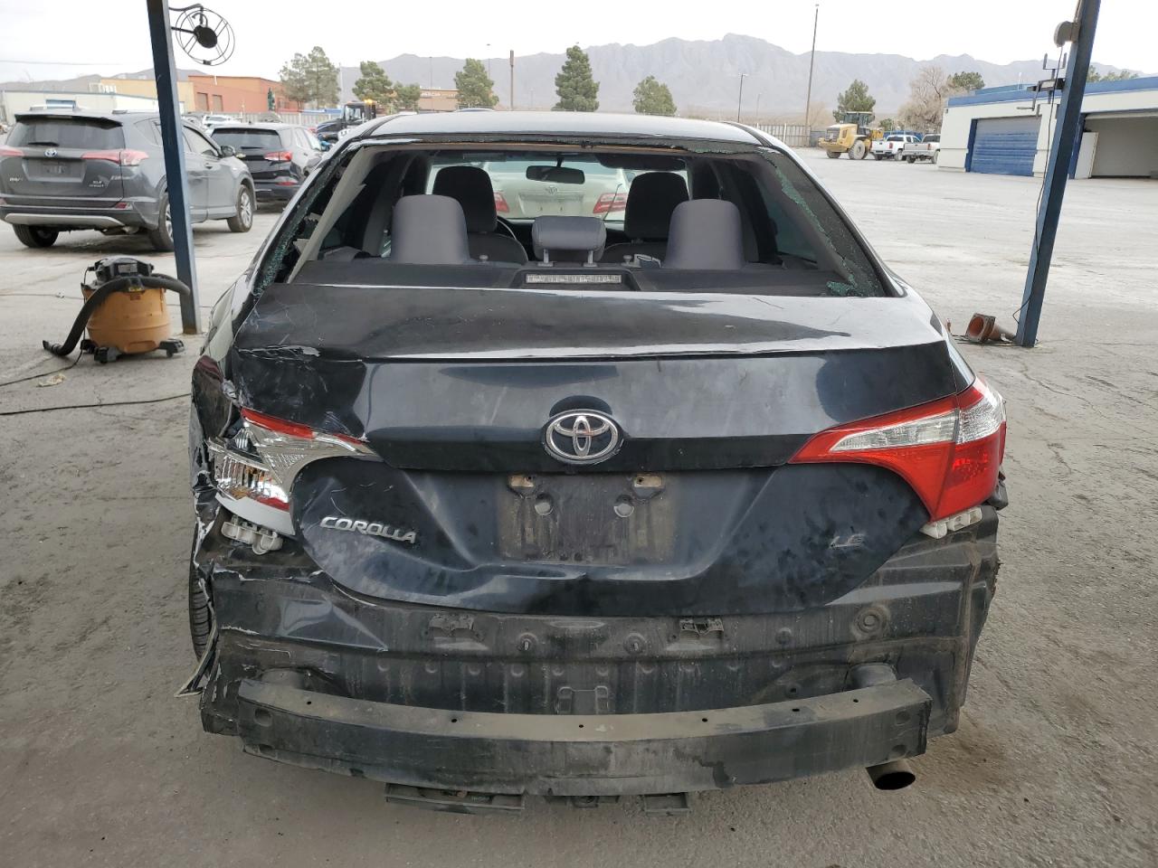 2015 Toyota Corolla VIN 5YFBURHEXFP287217 Copart auction photo, all over damage thumbnail 6