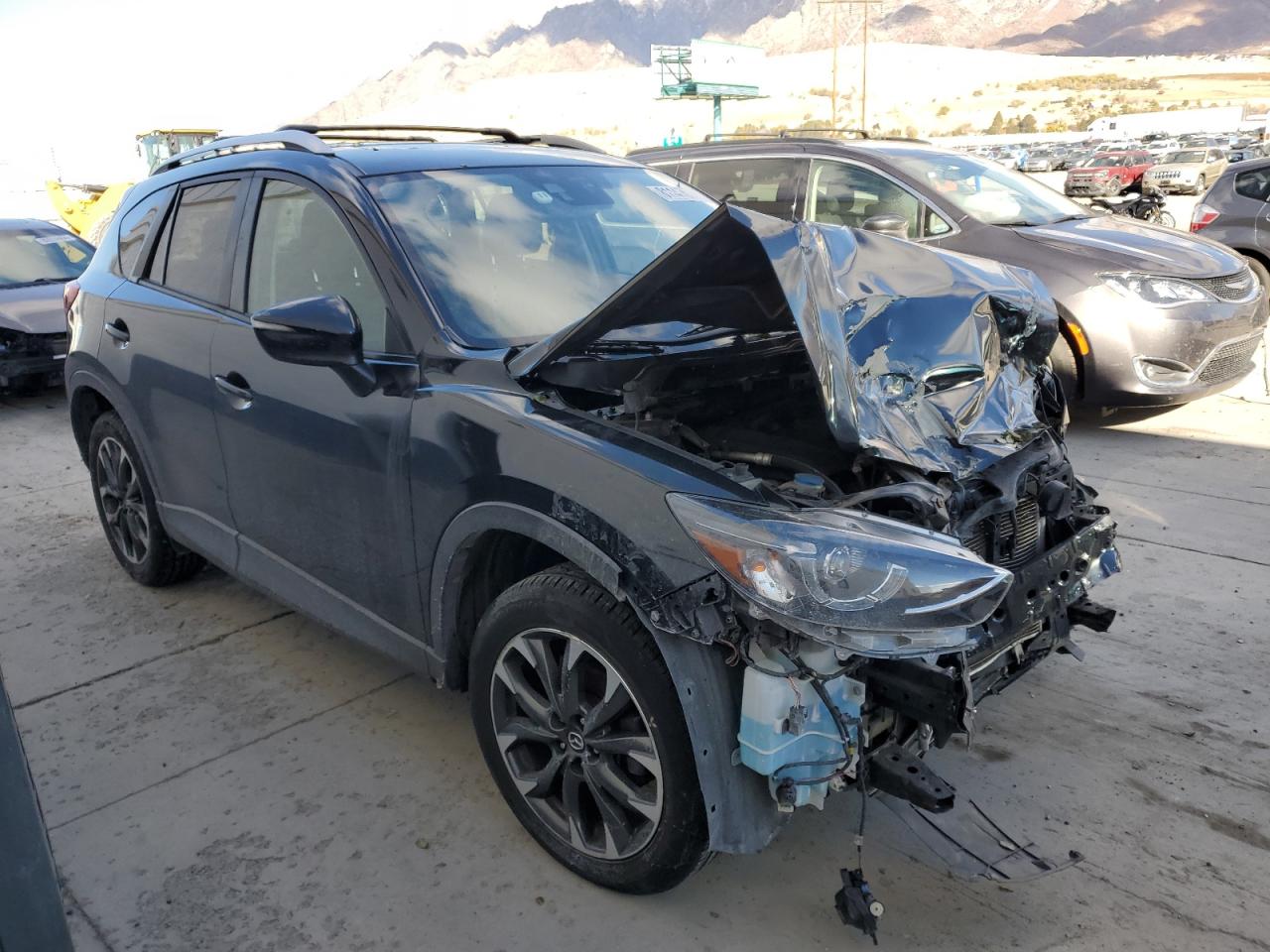 2016 Mazda CX-5 VIN JM3KE4DY2G0734805 Copart auction photo, front end damage thumbnail 4