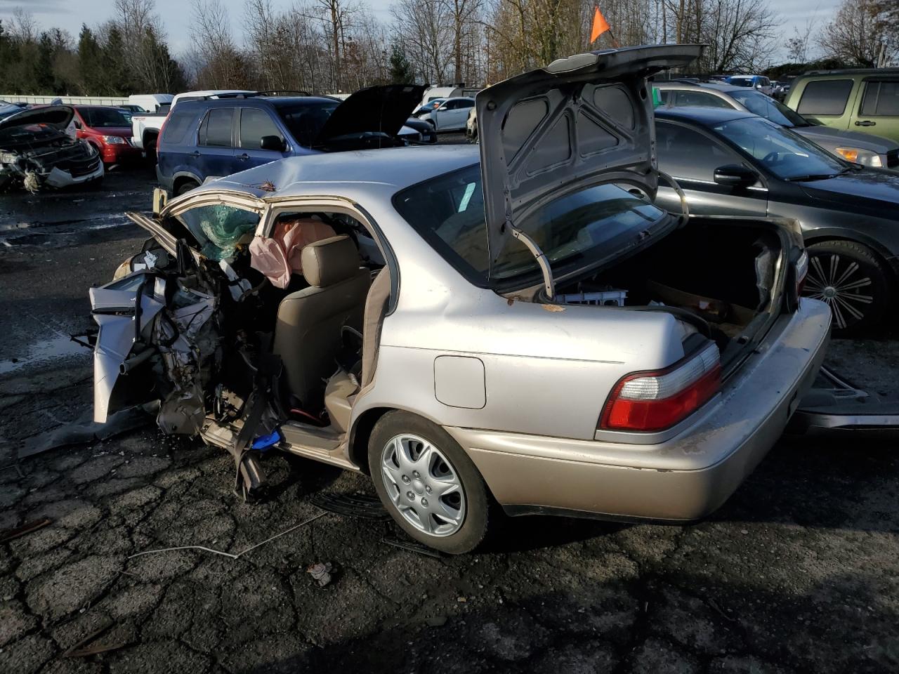 1997 Toyota Corolla VIN 1NXBA02E1VZ535302 Copart auction photo, all over damage thumbnail 2